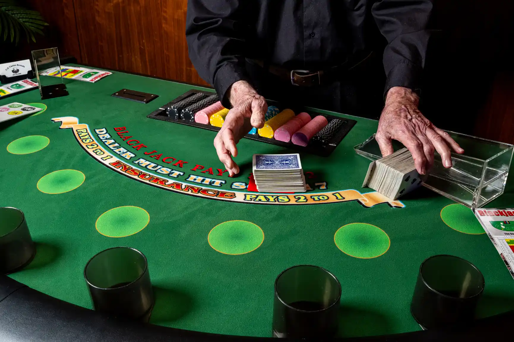 U.S. Casino Rentals Dealer preparing for a game of Blackjack